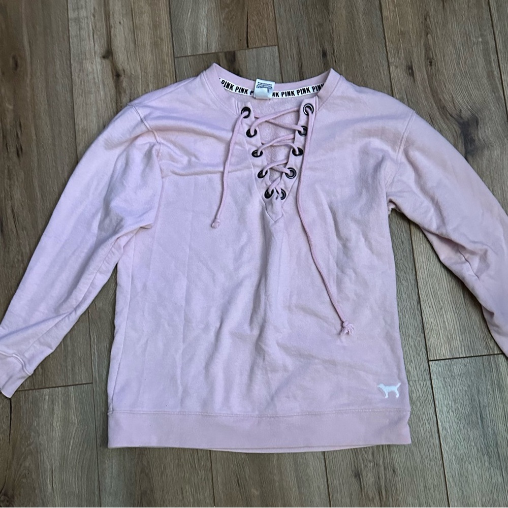 Victoria’s Secret light, pink sweatshirt, size extra small runs big